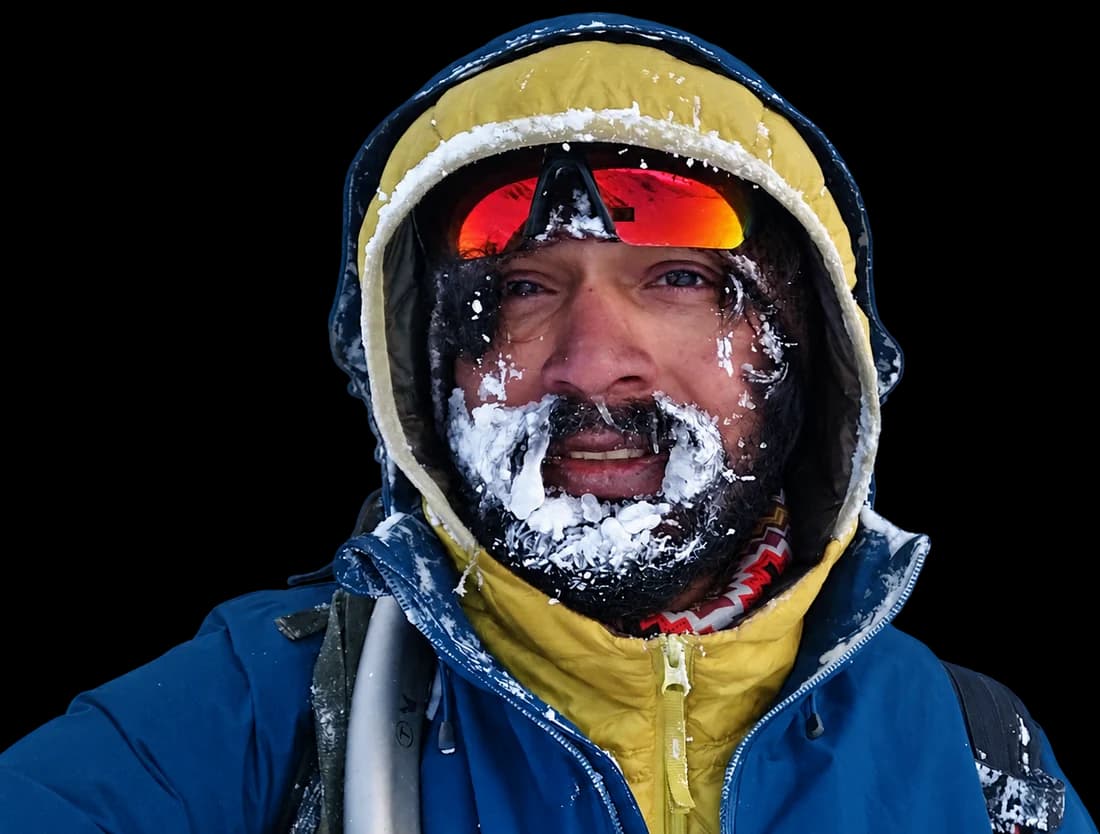 Intiaz Mahmud on a winter expedition, with snow on his beard and lips