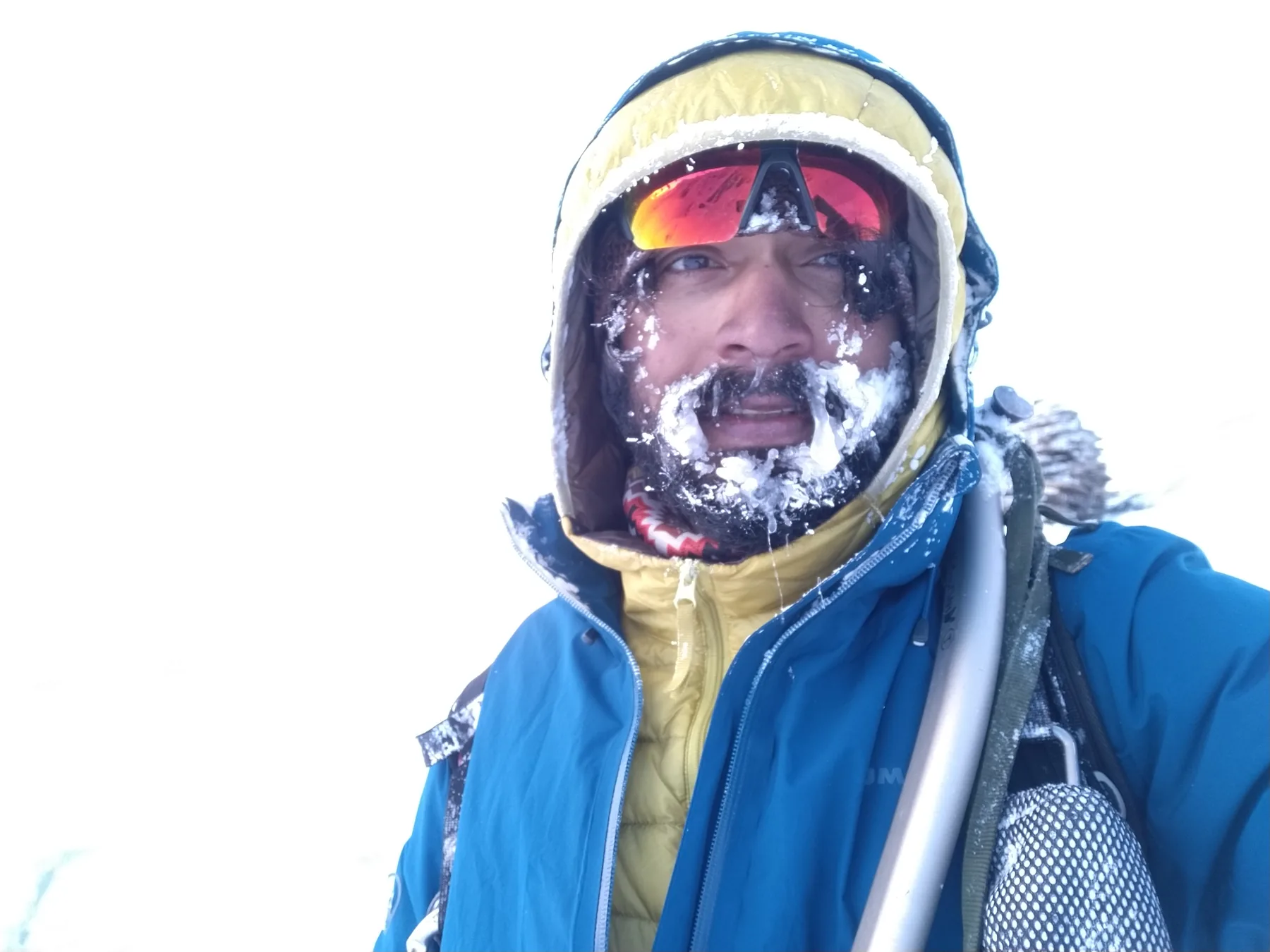 Intiaz Mahmud’s face and beard are covered in ice after the storm