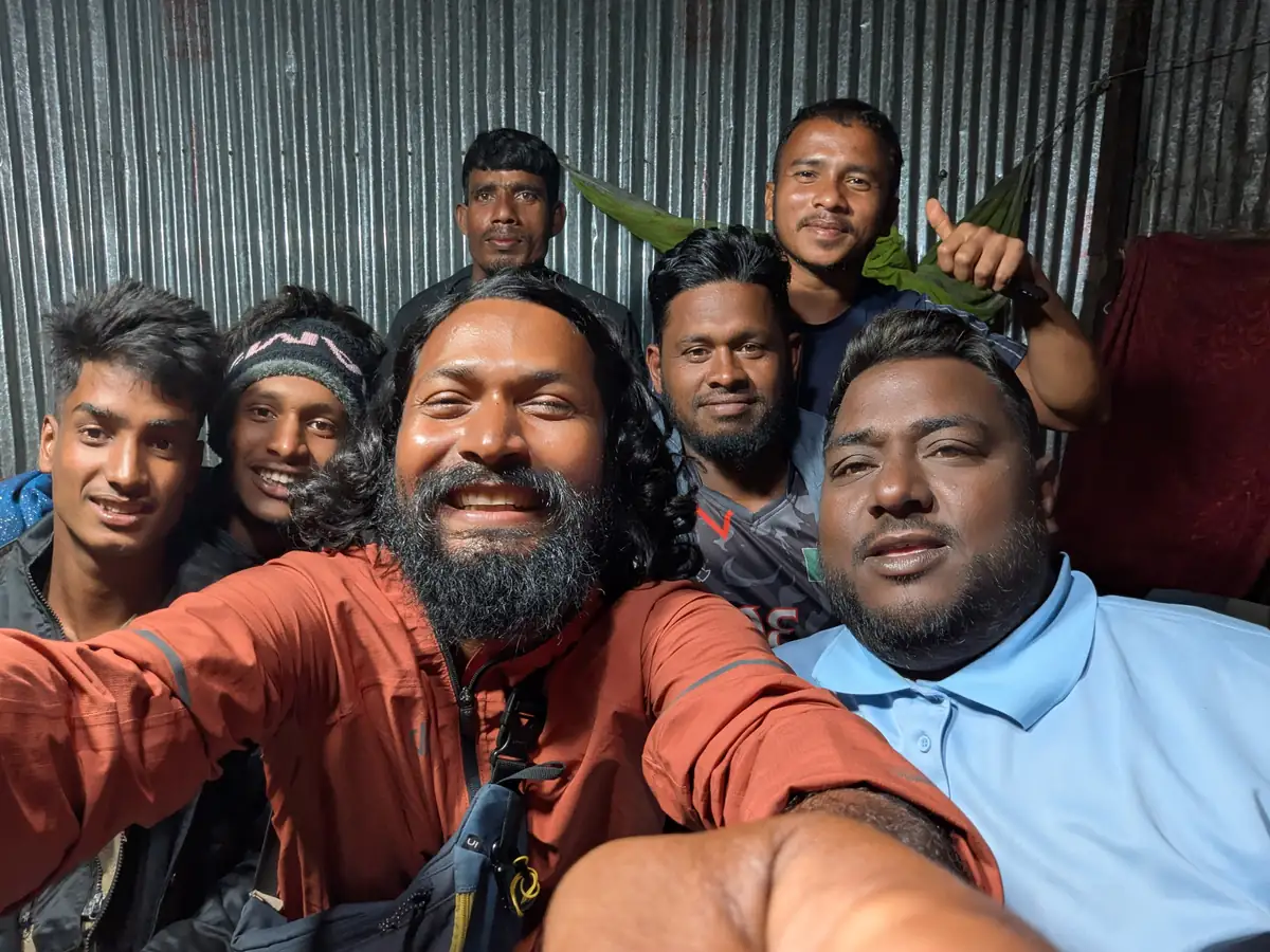 Intiaz Mahmud takes a group selfie with people he met during the kayak expedition